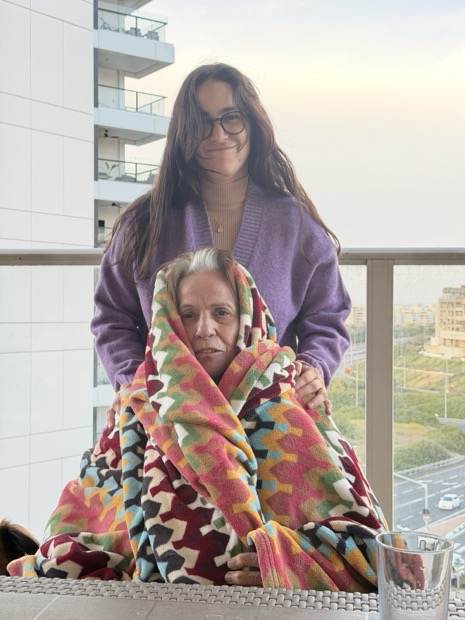 Balcony, blanket, laughter