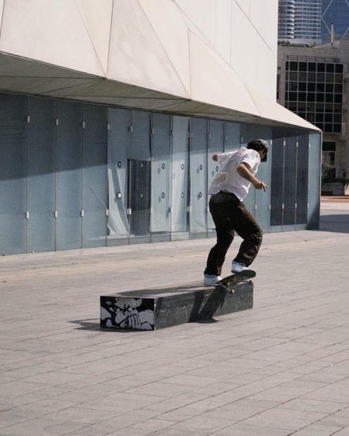 Grinding the ledge, white shirt