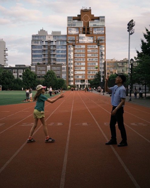 Tennis ball toss on the running track